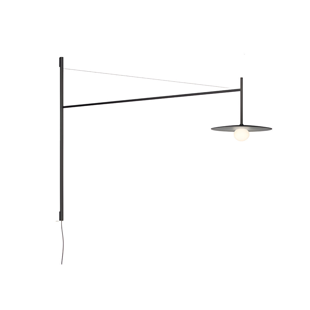Black metal cantilever wall lamp with shallow shade, isolated on white background to show clean proportions.
