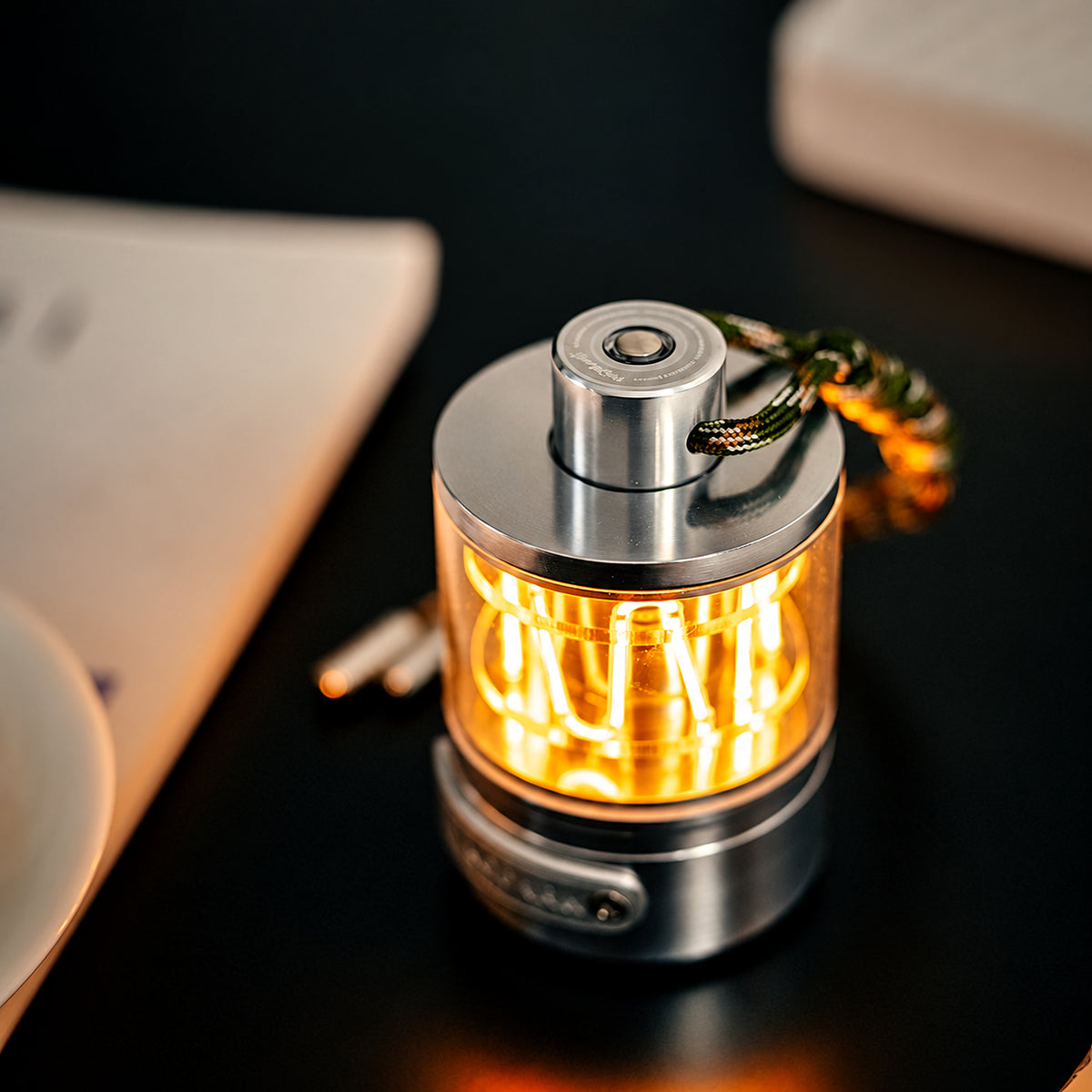 Heartbeat Glow portable lantern glowing on a modern desk.