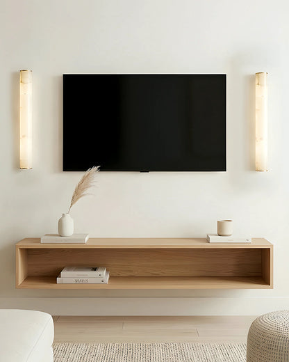 Modern wall light styled in a bedroom setting