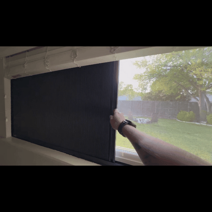SleepGuard blackout blinds GIF demo — light blocking test in bright daylight