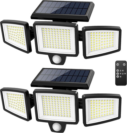 Two black solar security lights with three adjustable heads and remote control