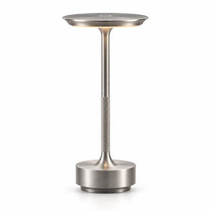 Satin nickel LED table lamp with a circular touch control on top of its slim disc shade - Airayvis