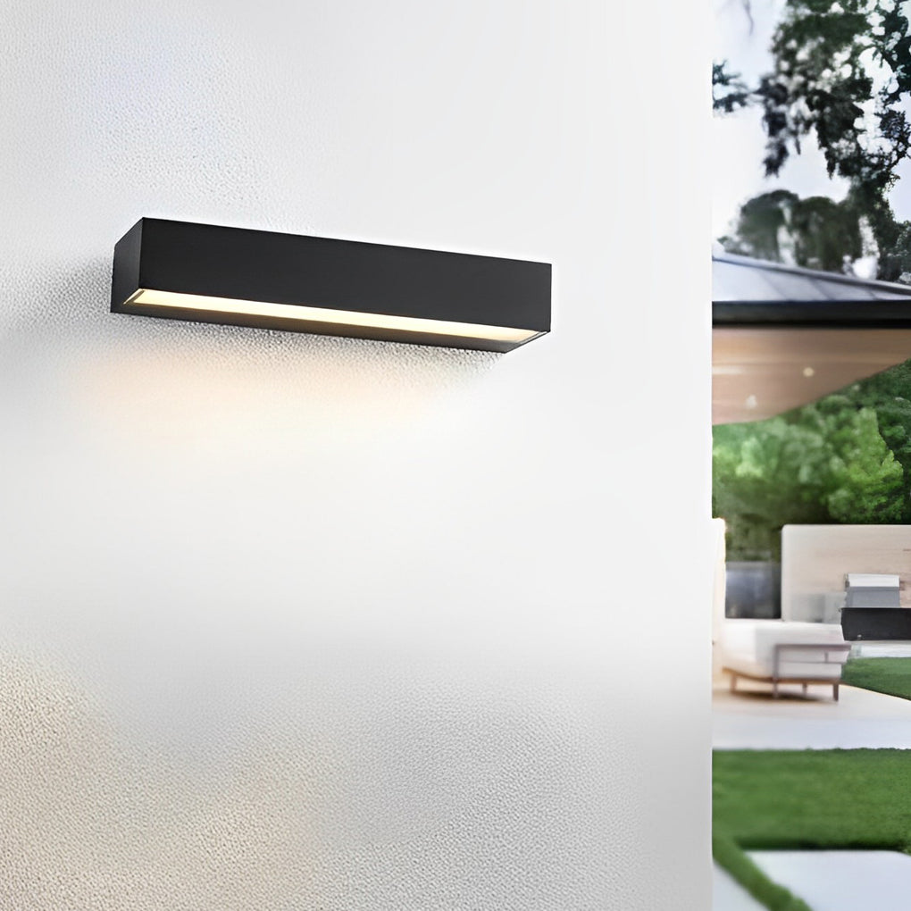 Minimalist exterior porch light fixtures mounted on white wall creating clean modern outdoor lighting.