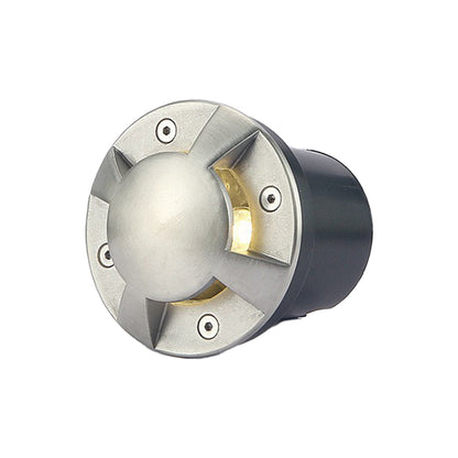 Metal deck lights providing ambient illumination for a contemporary garden.