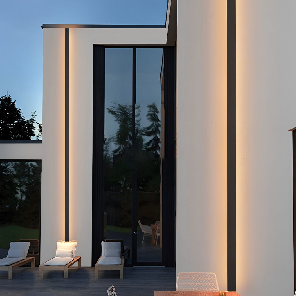 Outdoor strip wall light enhancing a bedroom exterior with purple glow.